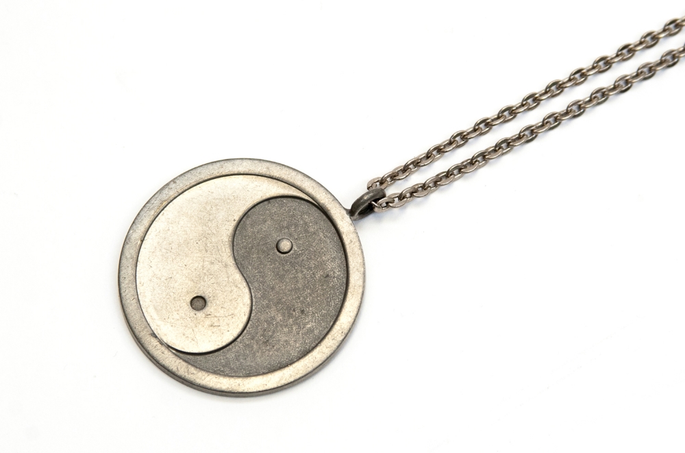 Jorgen Jensen, a Danish pewter pendant, Ying Yang, circa 1960, number 295, impressed marks, 5cm