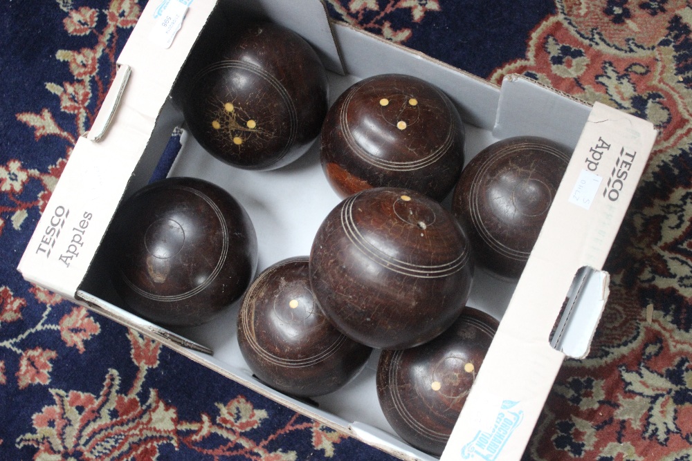 A collection of Lignum vitae bowling balls