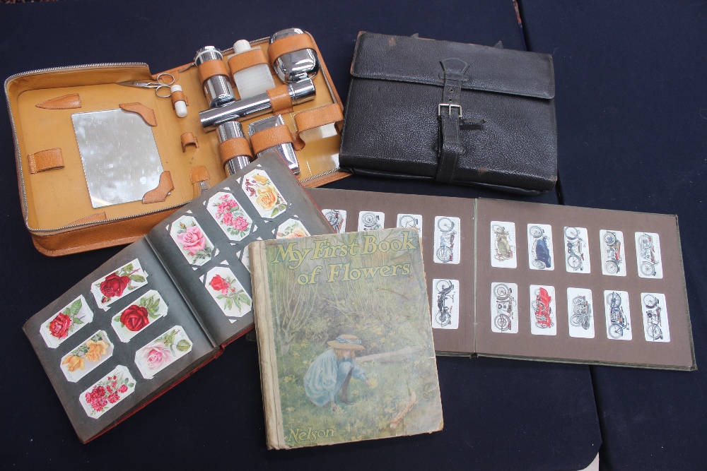 Two albums of cigarette cards, writing case and gentleman's toilet set, book of flowers 'My