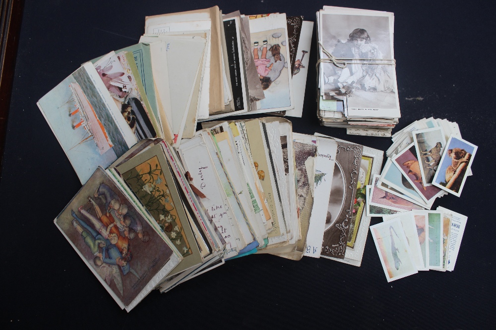 A good collection of postcards, dating from late 1800s onwards, with a small collection of Hornimans