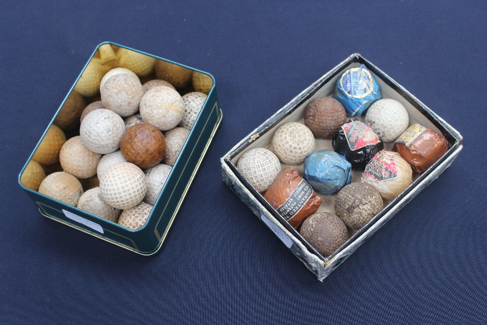 A collection of early 20th Century golf balls, including silver King square dimple etc, some in