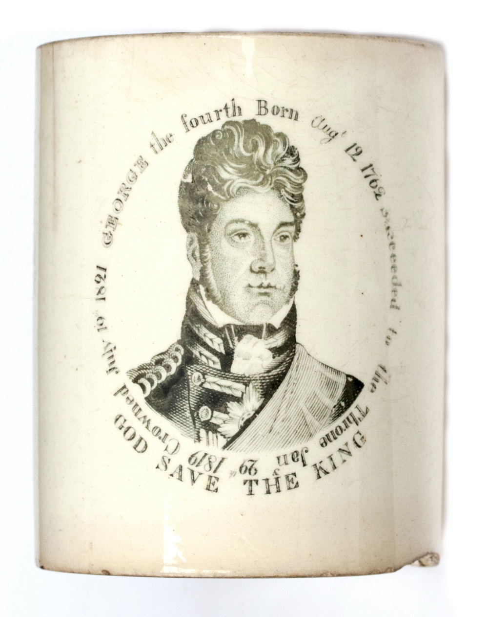 A dated cream ware commemorative mug of George IV succeeded to the throne Jan 29th 1819, crowned