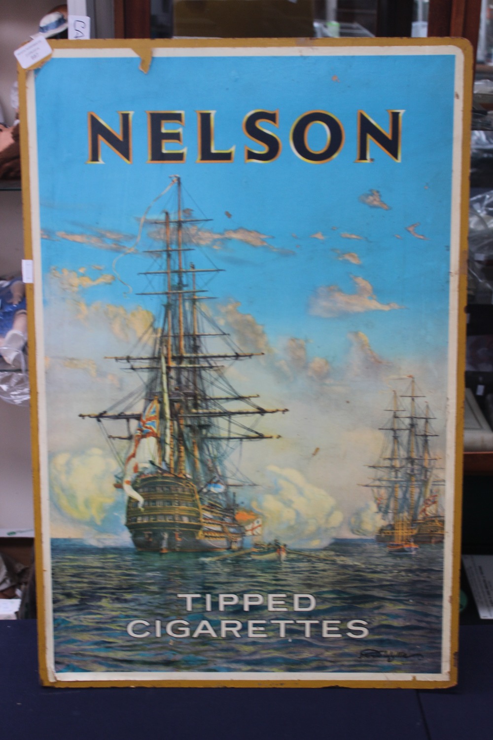 An original 1940s Nelson tipped cigarettes display poster, mounted twenty nine inches by nineteen