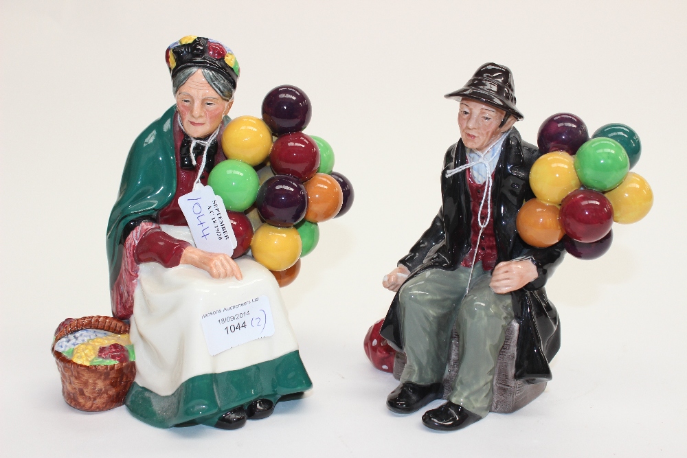 A Royal Doulton figure 'The Old Balloon Seller' HN 1315 and 'The Balloon Man' HN 1954 (2)
