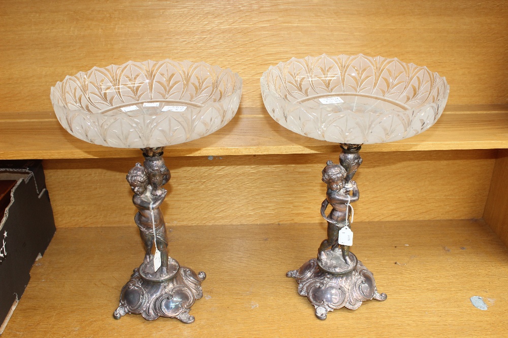 A pair of late 19th / early 20th Century silver plated comports with etched frosted glass dishes,