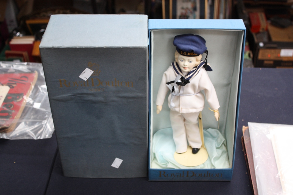 A Royal Doulton/Nisbet bisque head sailor doll for SS Nisbet, in original box