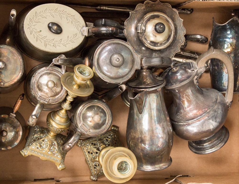 A box of silver plate including hotel ware, brass candlesticks, jug etc.,