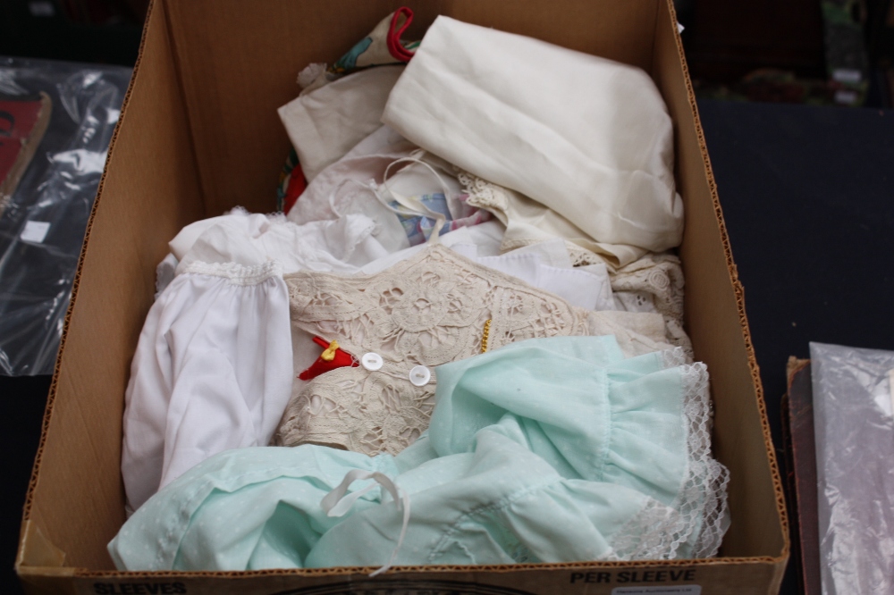 A large quantity of dolls clothes