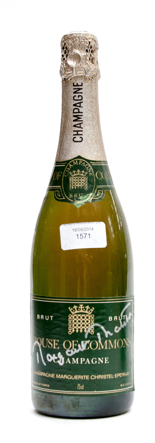 A bottle of House of Commons Champagne, signed by Margaret Thatcher
