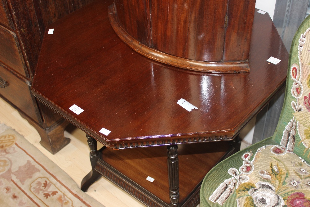 A Victorian Aesthetic mahogany octagonal occasional table, of two-tier form, raised on turned