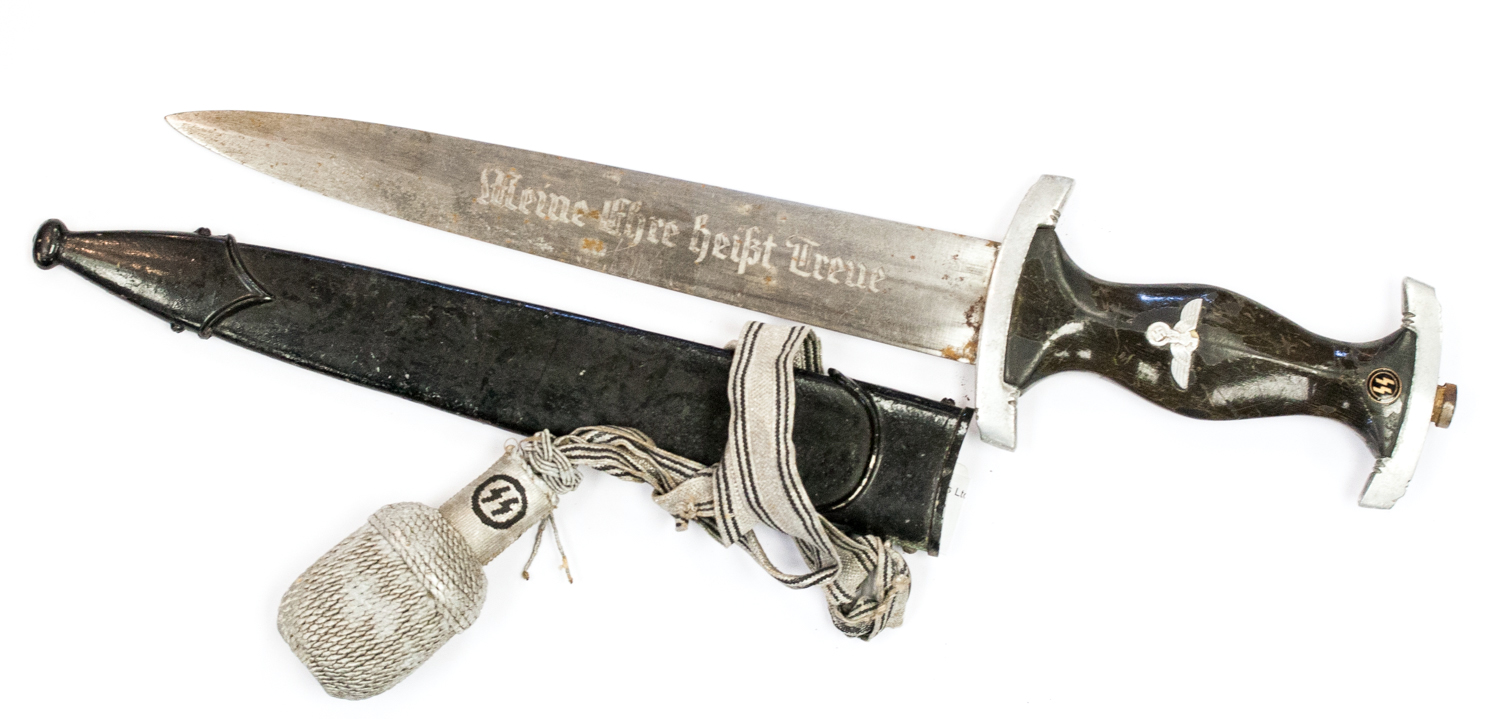 A German Second World War SS dagger and scabbard, stamped RZM M7/49, 1203/38 SS, blade engraved '