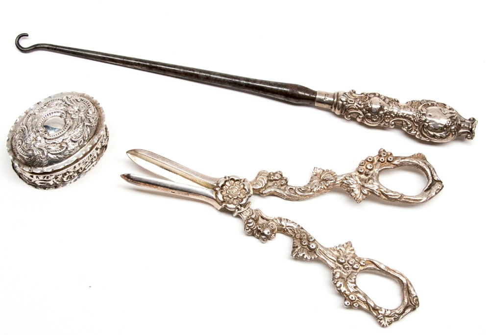 A pair of modern silver grape scissors, the handles cast with fruiting vines, Sheffield 1997,