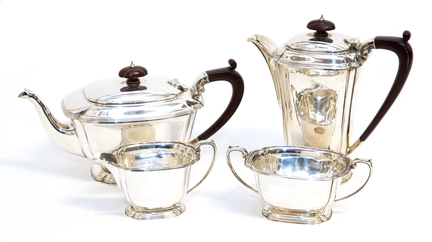 A mid 20th century Art Deco style silver four piece tea and coffee set, Adie Brothers, Birmingham