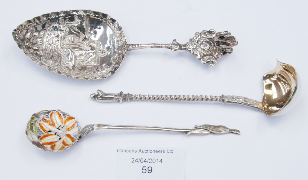 A continental silver (probably Dutch) anointing spoon .930 impresses assay marks, London; together