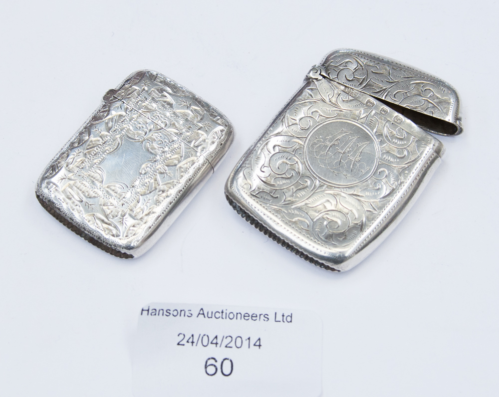 A Victorian silver Vesta Case, leafage and engraved Birmingham 1892, together with a further Vesta