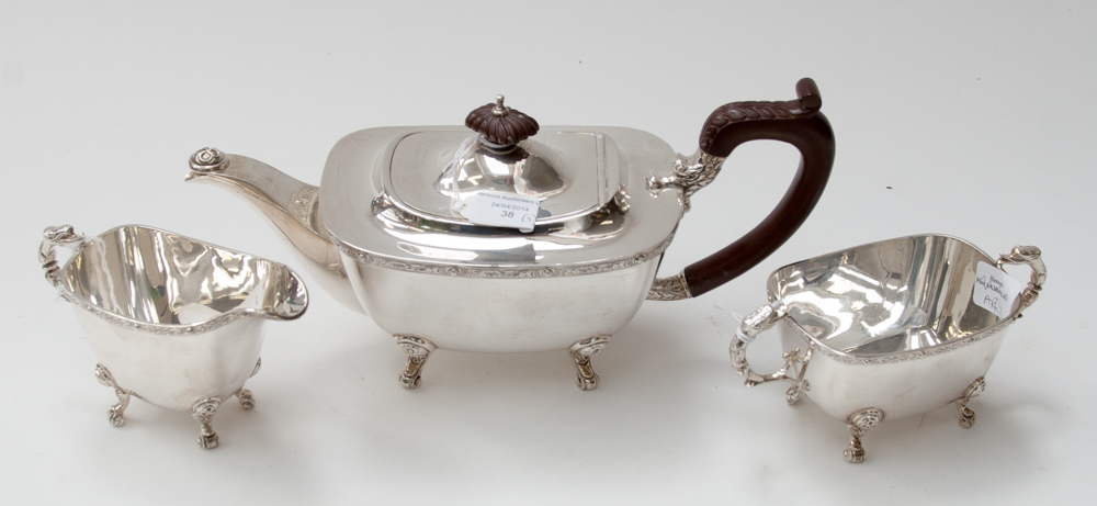 A three piece Birmingham 1971 tea service - in a Victorian style but enhanced with Celtic knot and