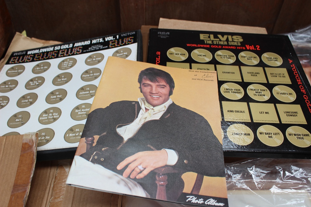 Two Elvis Presley box sets, volume one and volume two in near mint condition (cat no LPM-6402/6401)