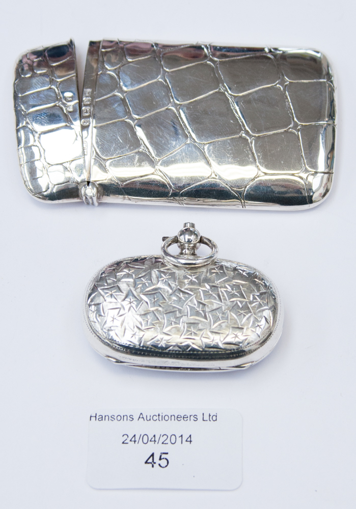 An Edwardian silver sovereign case, together with a silver card case with crocodile skin