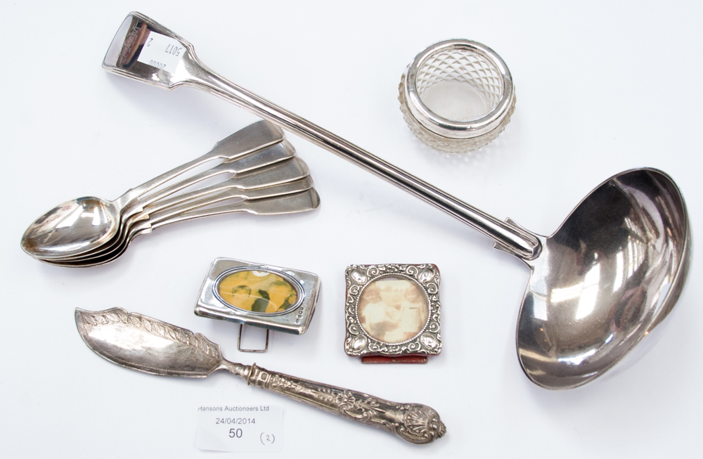 A bag of assorted George III silver teaspoons, two miniature silver photo frames, a silver rimmed