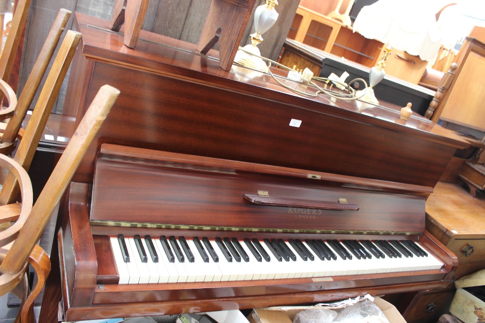 A Rogers of London upright piano, comprising 7¼ octaves, fitted in a mahogany case, complete with