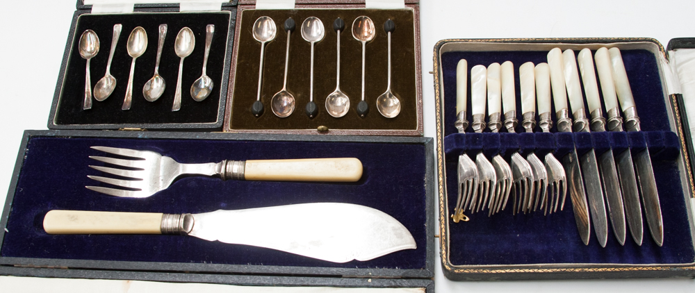 A boxed set of Sheffield silver coffee spoons, a boxed set of white metal Mappin and Webb coffee "