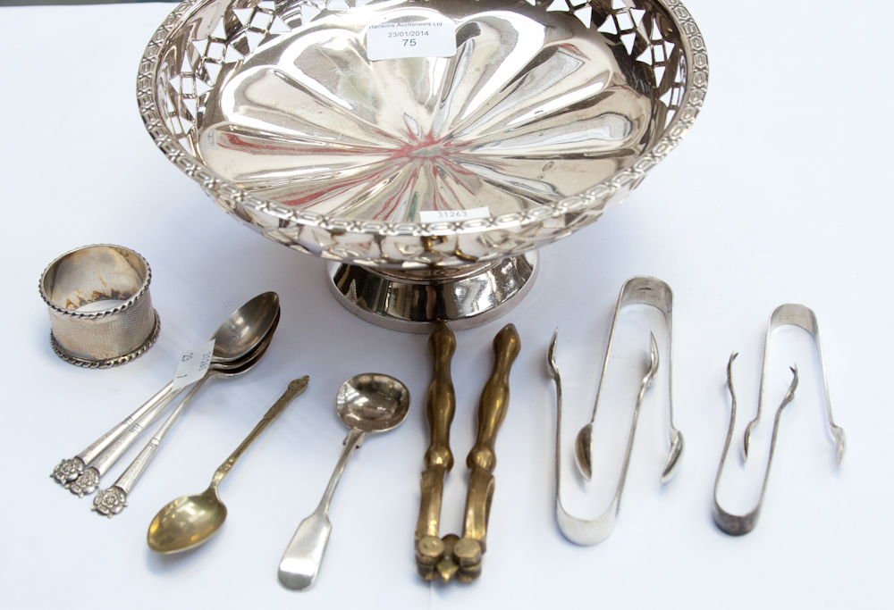 A collection of silver and silver plate including silver napkin ring, silver teaspoons, plated