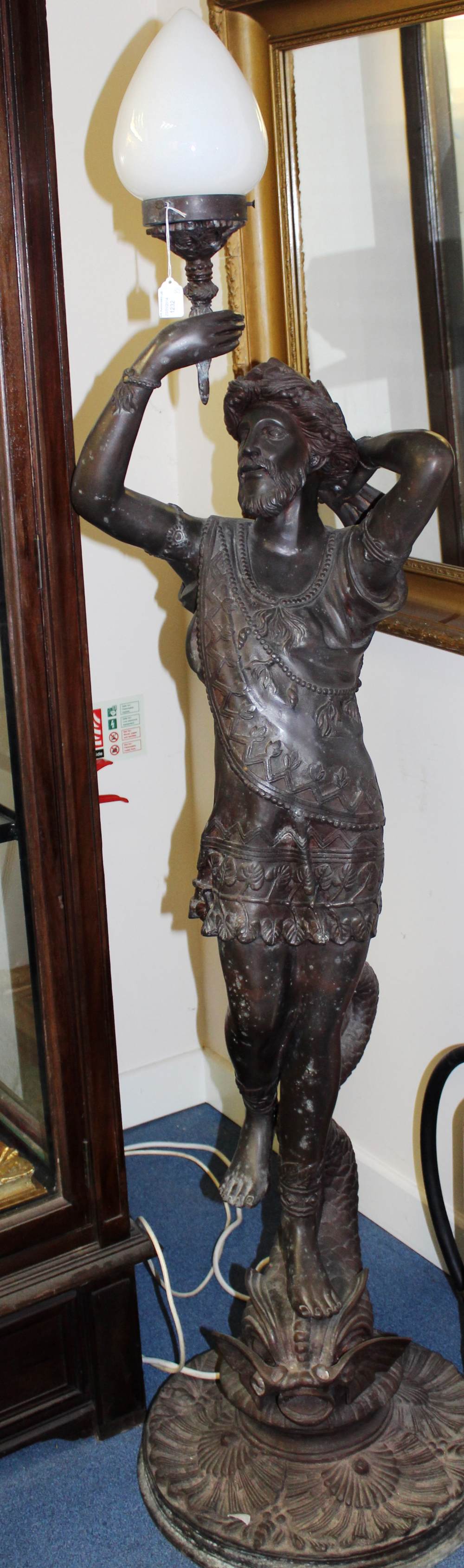 **VENDOR WITHDRAWN** A pair of cast bronze early 20th Century mythical figural floor standing