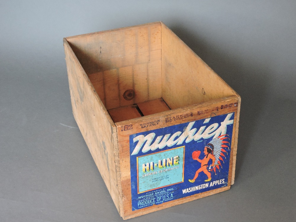 A mid 20th century Nuchief brand apple crate, of stout construction containing one bushel by volume,
