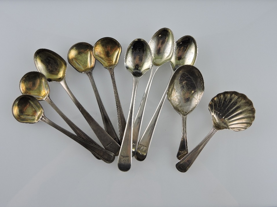 Two early 19th Century silver hallmarked caddy spoons, one of scallop form, the other pin