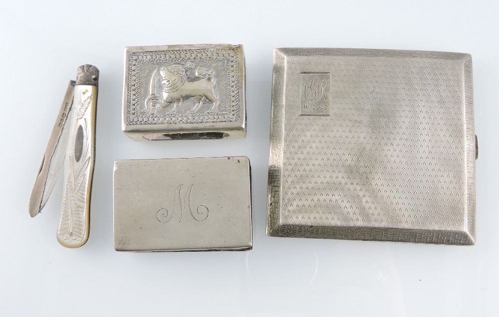 A silver hallmarked cigarette case of square form, two silver matchbox holders and a folding fruit