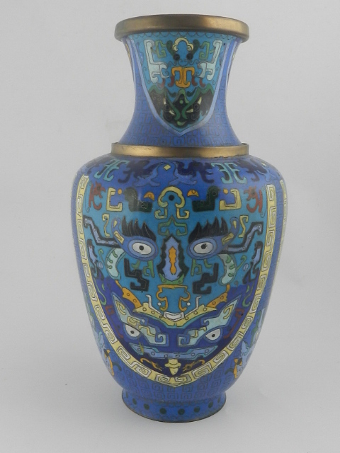 An unusual late 19th/early 20th century Chinese cloisonne vase, with geometric stylised mask