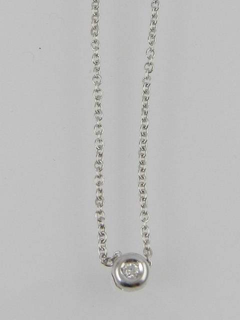 A white metal and diamond set necklace with fine belcher link chain.