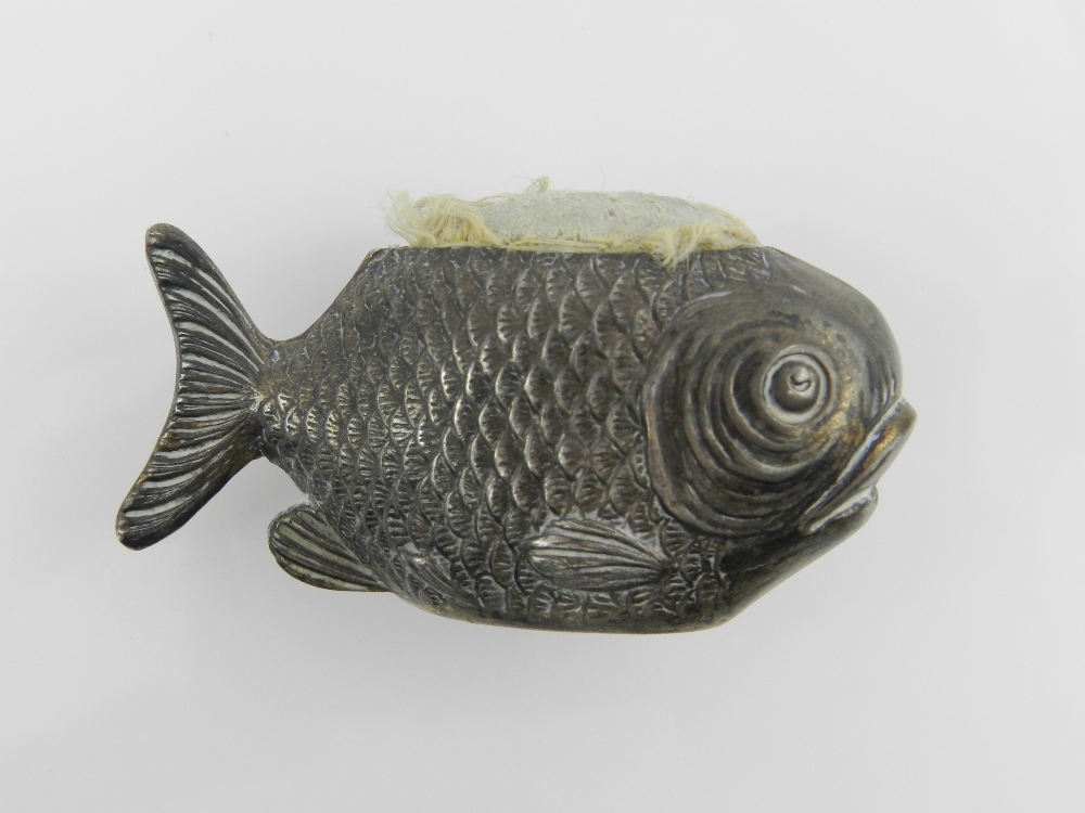 Sampson Mordan & Co.  A silver novelty pin cushion, fashioned as a fish, hallmarked Chester, 1909.