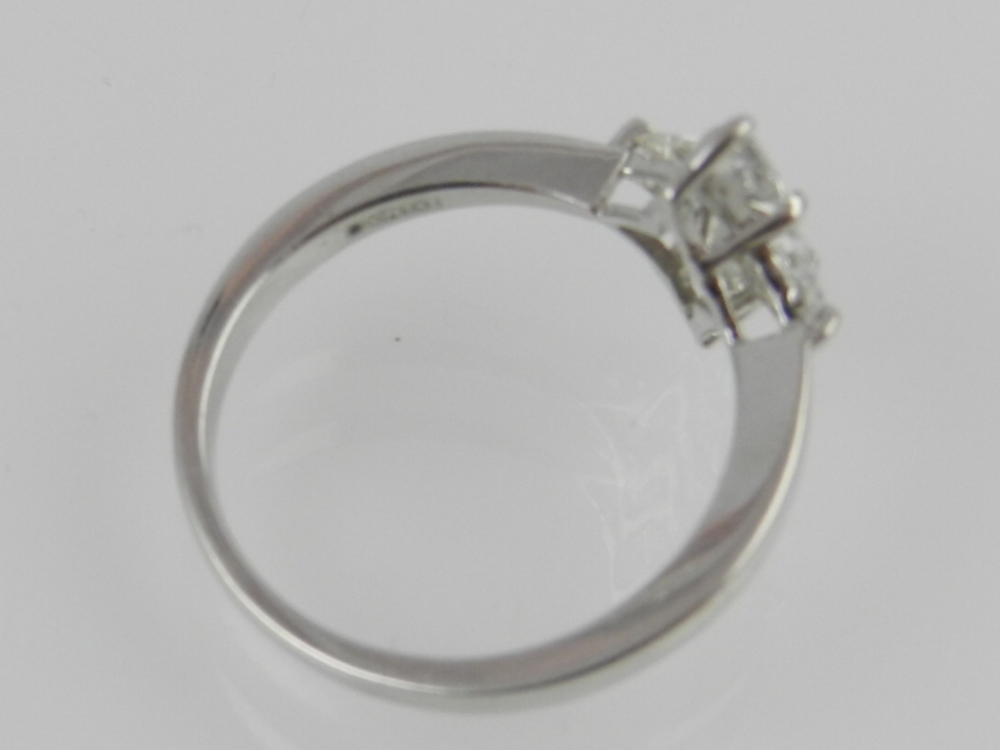 An 18ct white gold diamond set dress ring, set with ascher and trillion cut stones of - Image 2 of 2