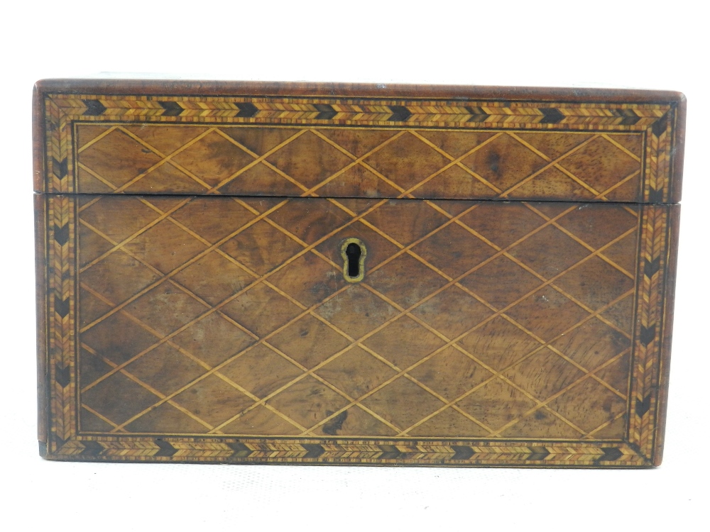 A George III fruitwood tea caddy, with micro mosaic chevron banding, the hinged top and front inlaid