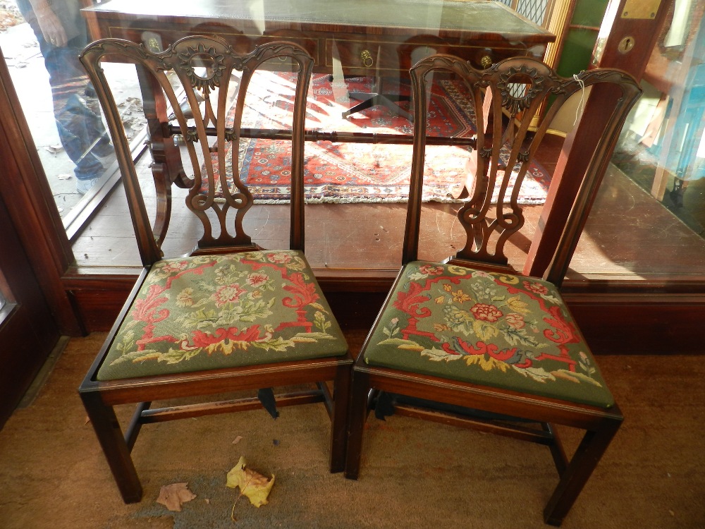 A pair of Chippendale style mahogany dining chairs, 20th century.