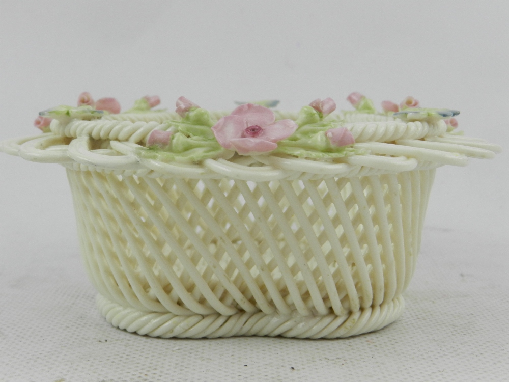Belleek, Ireland. A hard paste porcelain basket, decorated with shamrocks and pink pansies, - Image 2 of 3