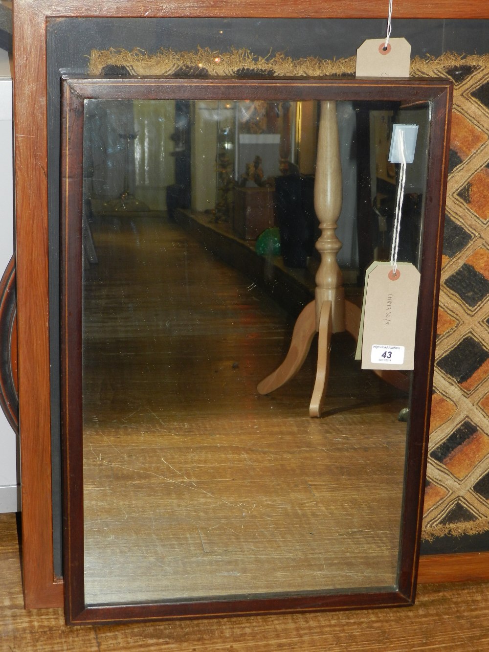 An early 20th century mahogany and inlaid boxwood mirror, inset rectangular plate. H.65cm W.42cm