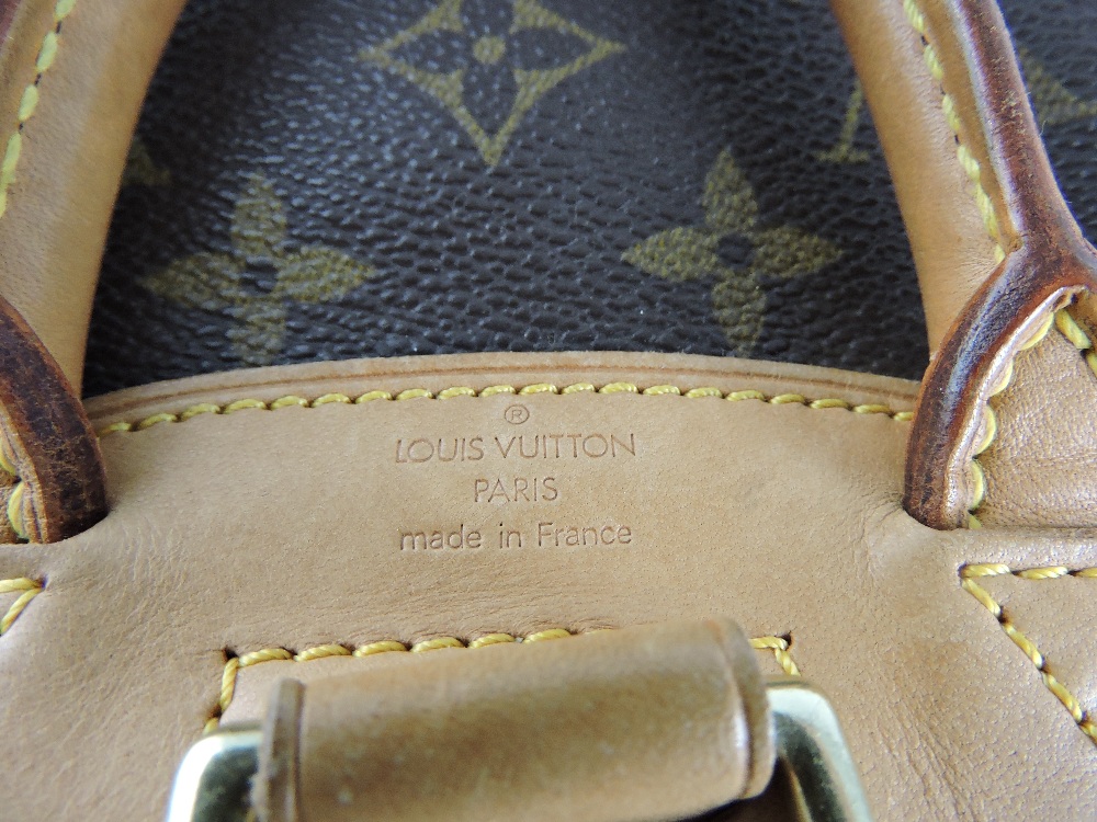 A Louis Vuitton ladies mini montsouris hand bag, in monogrammed brown cloth with tan leather base - Image 2 of 2