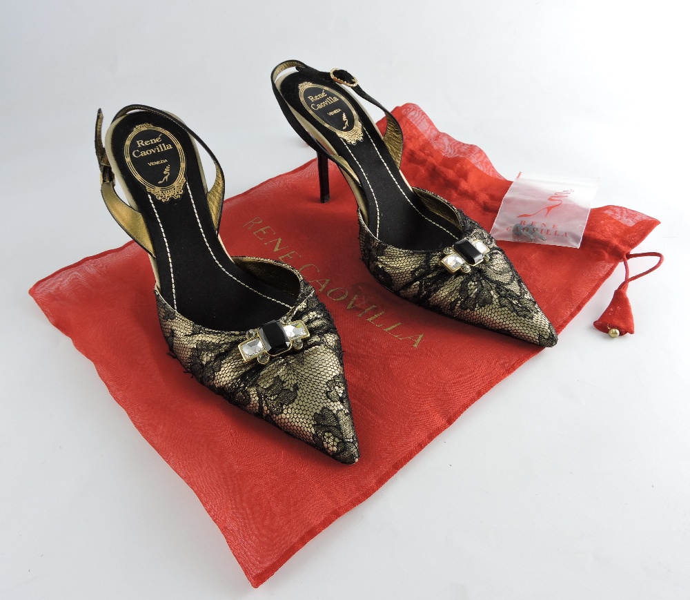 A pair of Rene Caevella shoes, healed sling back, black lace over gold and set with a faux