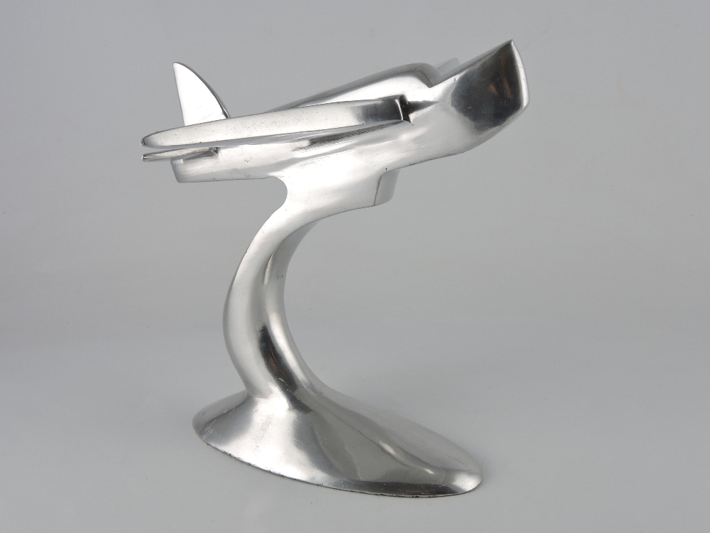 A cast metal desk piece modelled as a 1950s seaplane, H. 23cm.