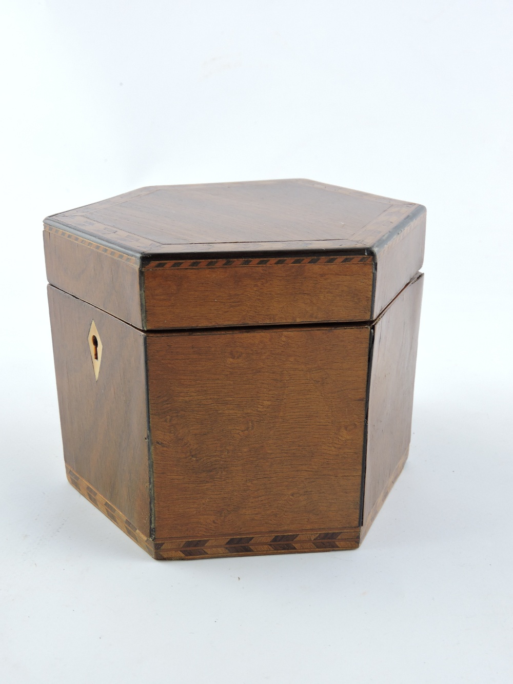 A George III mahogany and maple hexagonal tea caddy with feather and chequer banded inlay. Dia; - Image 2 of 4