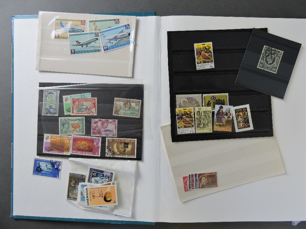 A collection of stamps in three stock albums, loose leaves and unmounted, mainly George VI, mint and