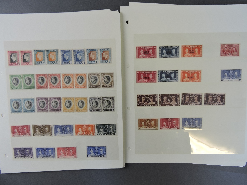 A collection of stamps in three stock albums, loose leaves and unmounted, mainly George VI, mint and - Image 4 of 5