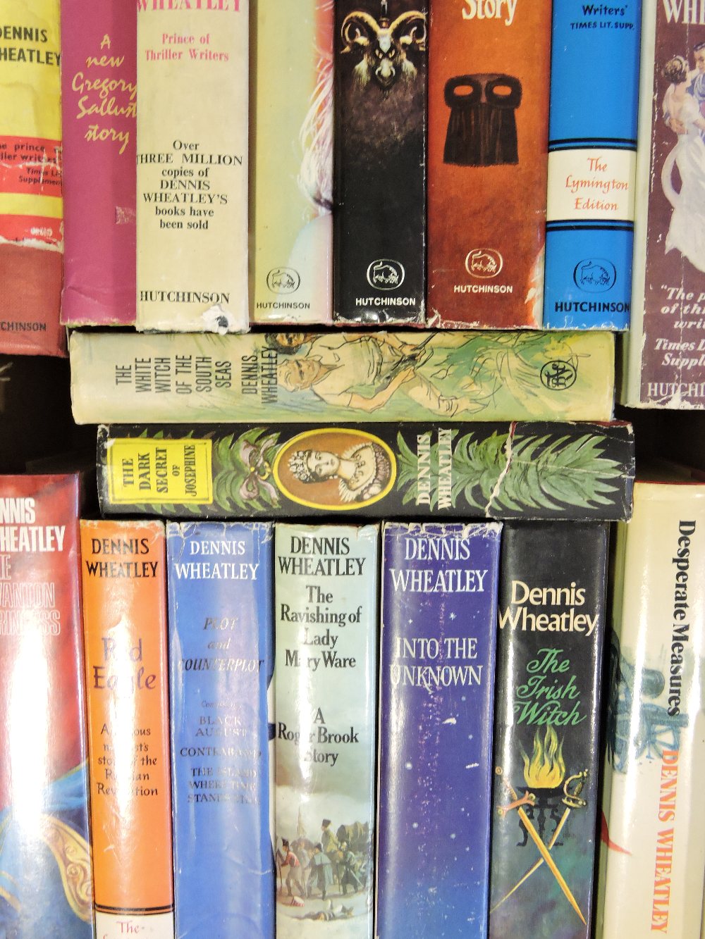 Dennis Wheatley, seventeen hardback editions with dust jackets, mostly first editions.