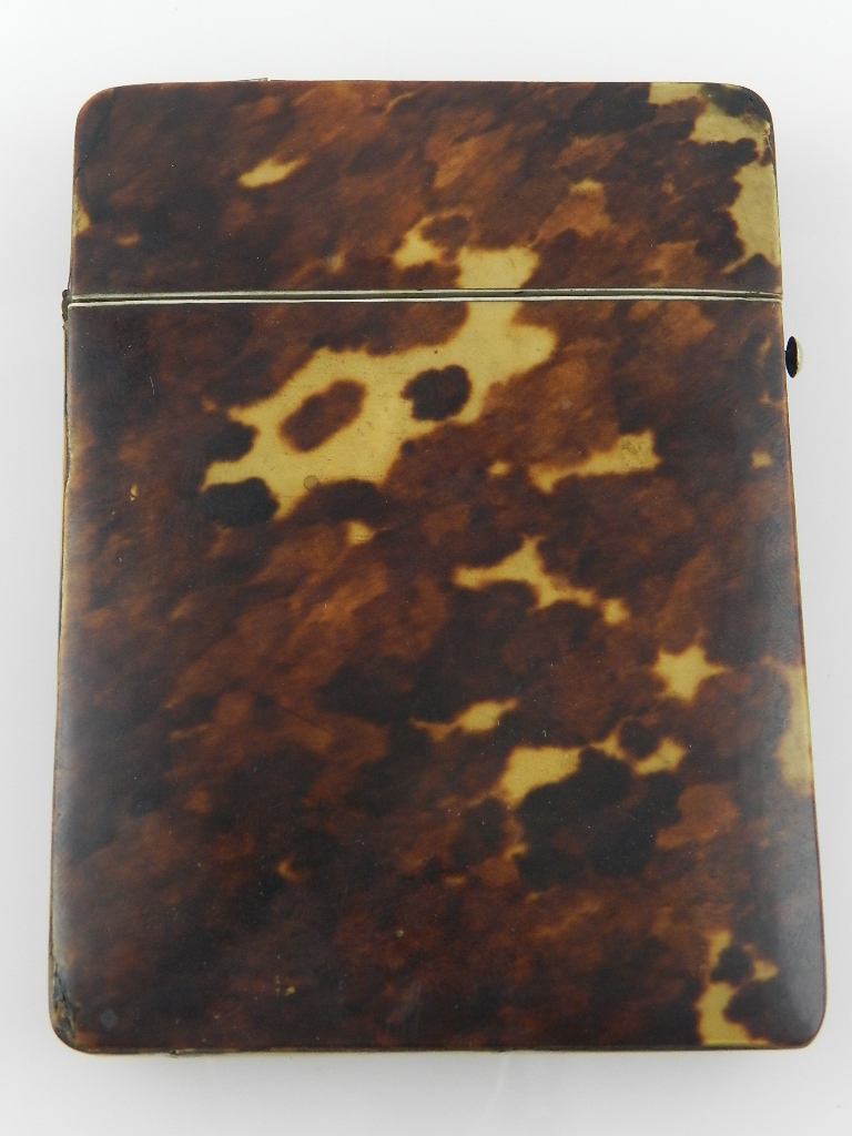 A late Victorian tortoiseshell card case. H: 10cm W: 7.5cm