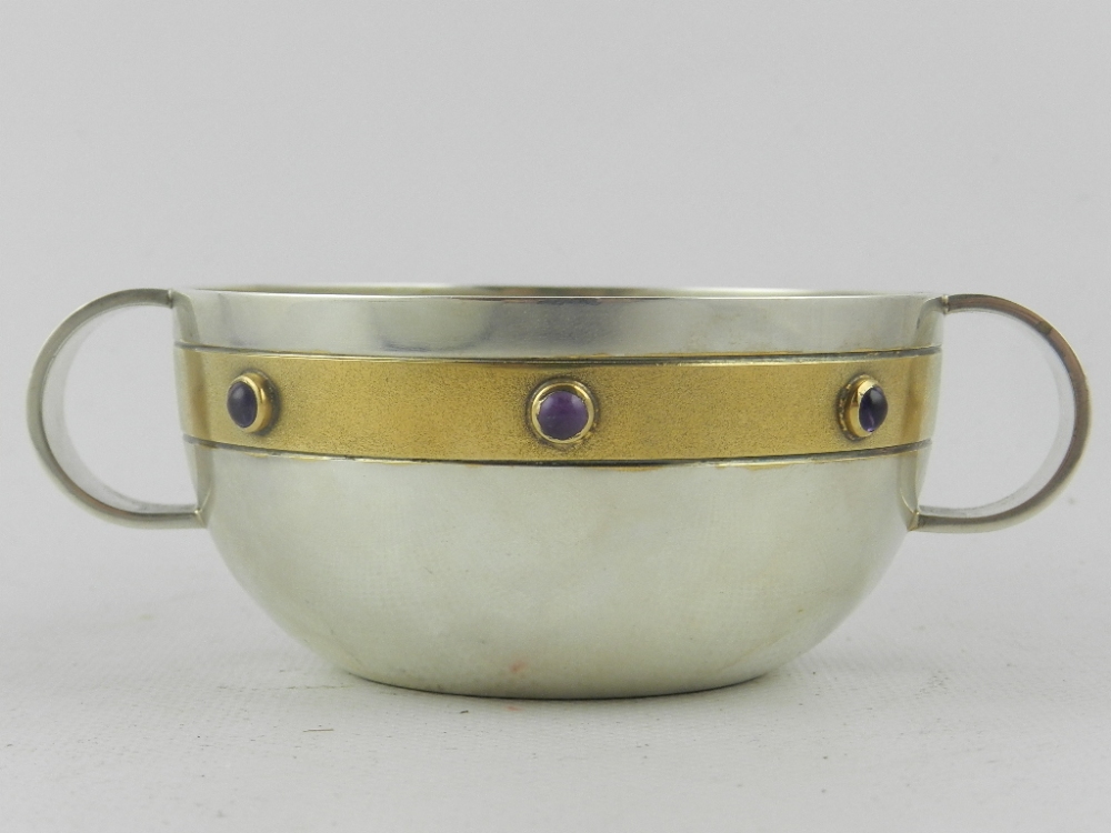 A silver twin handled quiach, decorated cabochon jewel banding, hallmarked Birmingham 1994.