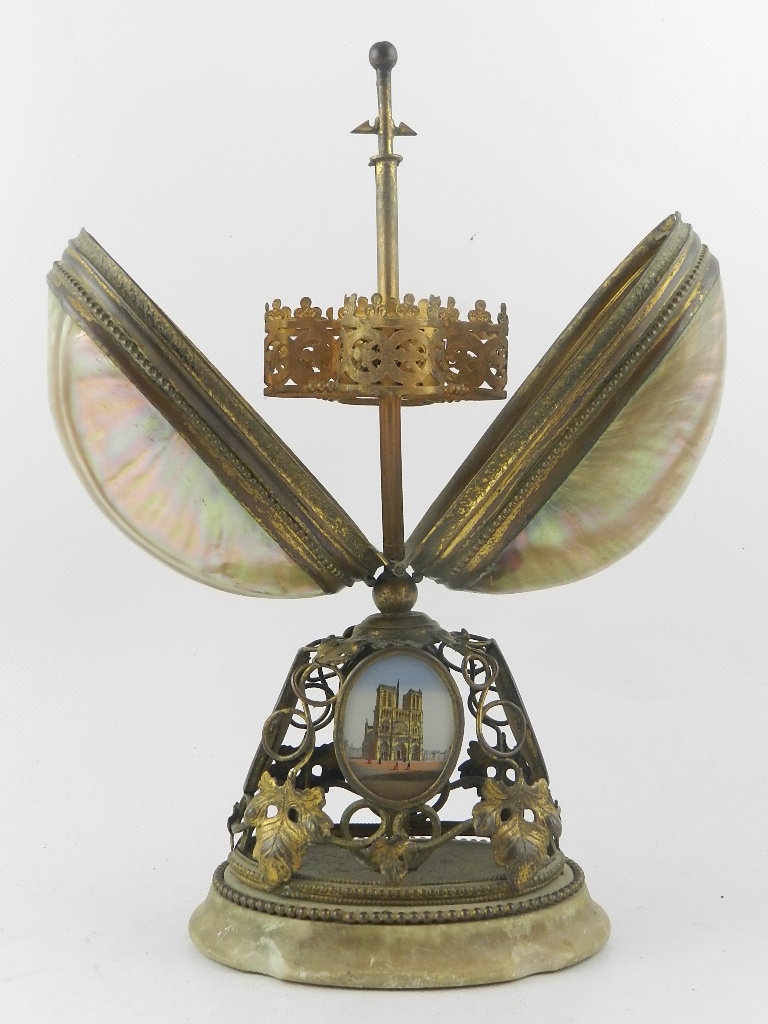 A late 19th century French alabaster and gilt metal mounted perfume stand, having a nautilus shell