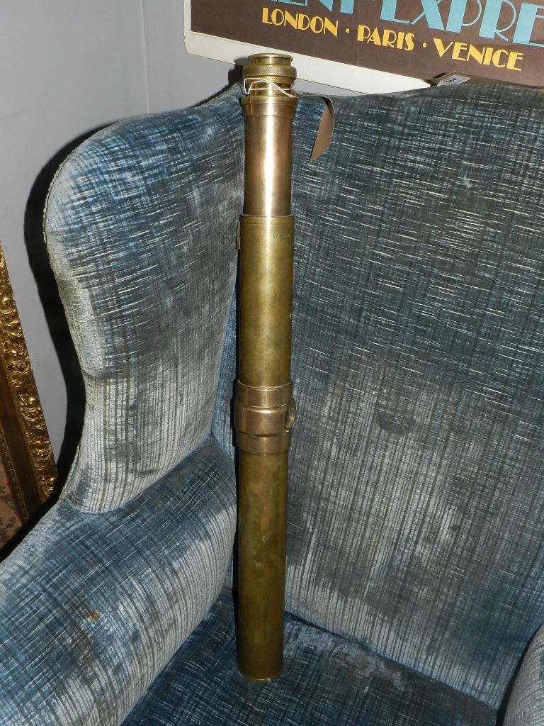 Ross of London. An early 20th century brass light refracting telescope with adjustable objective