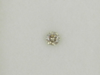 A loose diamond of approx. 0.15 carats.